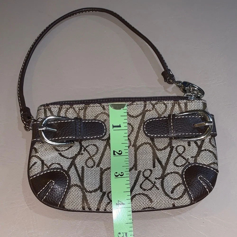New York & Company Brown and Cream Logo Wristlet​​​